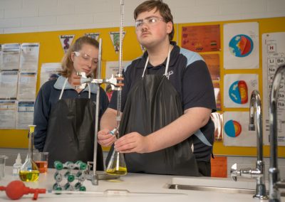 Two students at the lab during Chemistry class